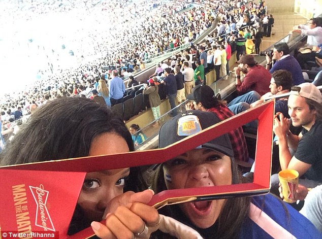Rihanna celebrates Germanys World Cup win against Argentina By Flashing Her Bra